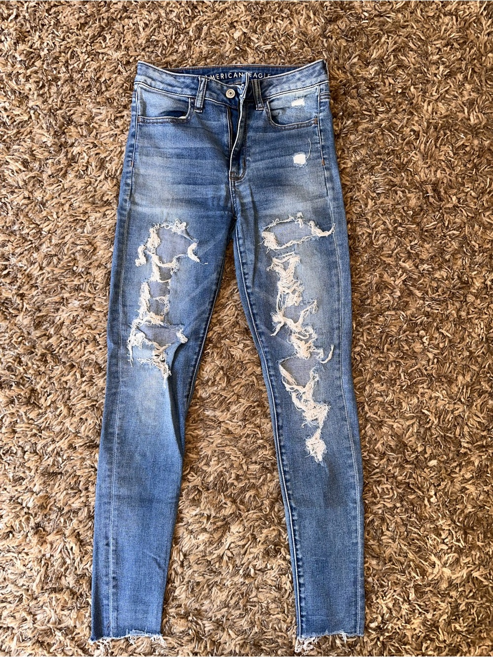 American Eagle Outfitters Ripped Light Blue High-Rise Skinny Jeans